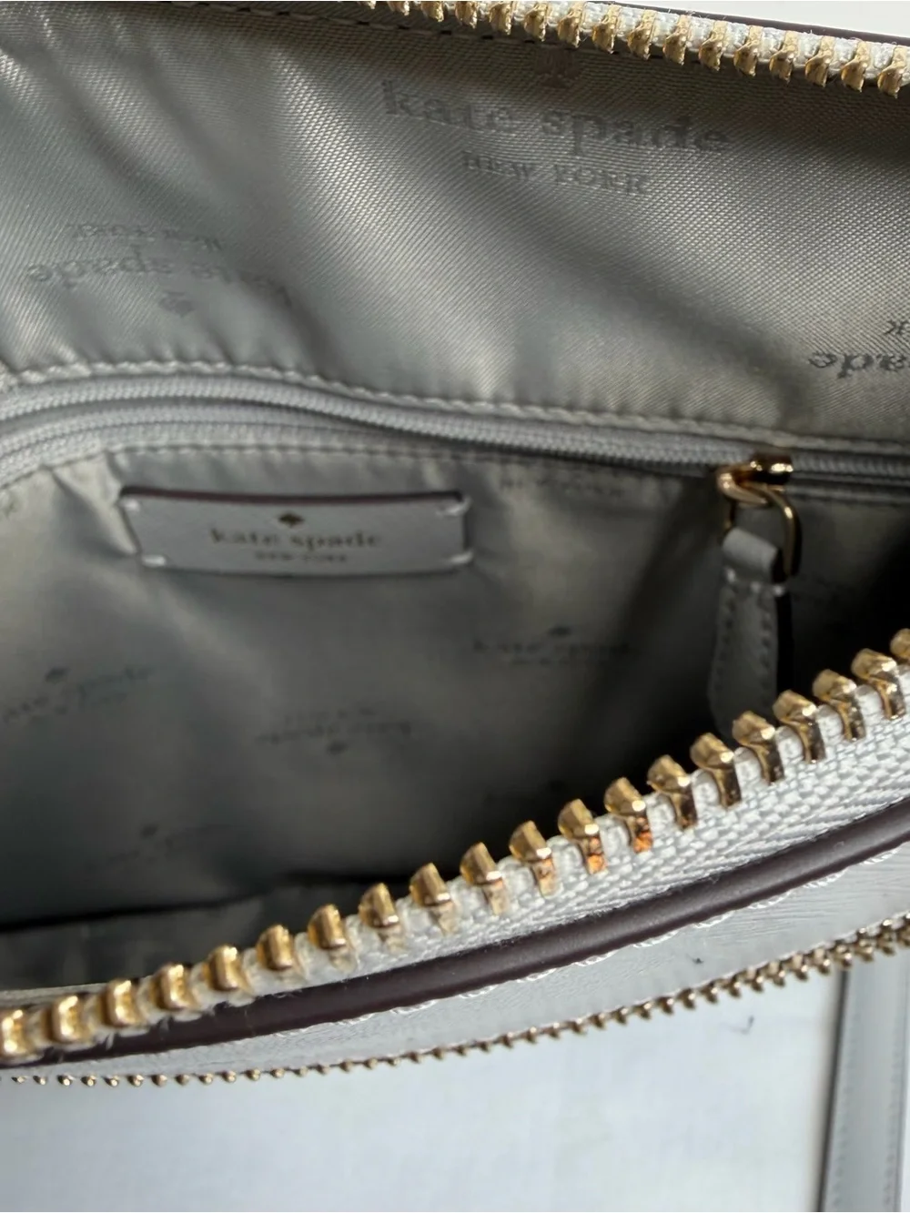 kate spade light gray saffiano leather messenger bag with gold hardware